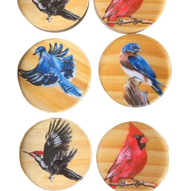 Collection of hand-painted coasters featuring colorful bird illustrations