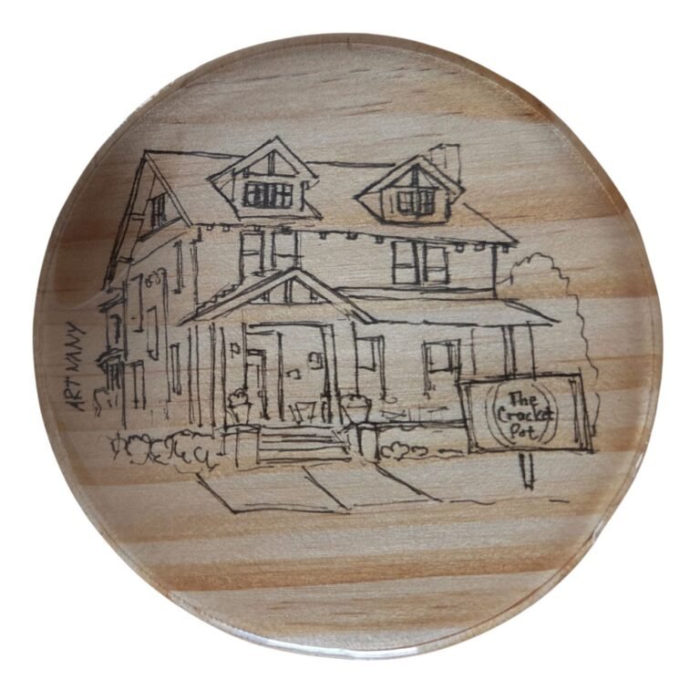 Hand-drawn architectural illustration on a custom coaster